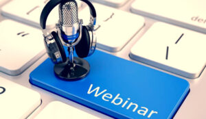 Keyboard with a blue Webinar button